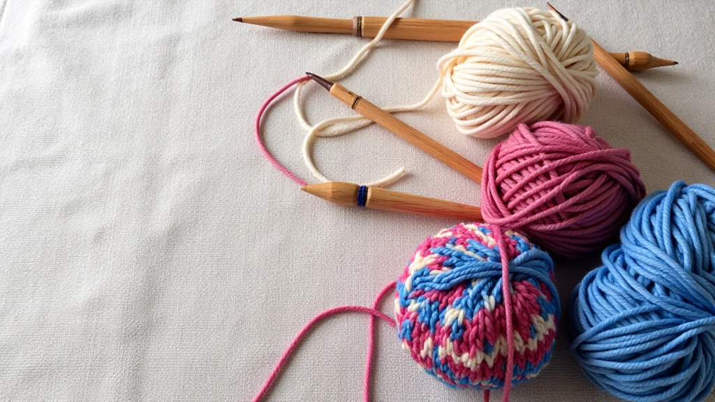 Knitting needles and colourful yarn